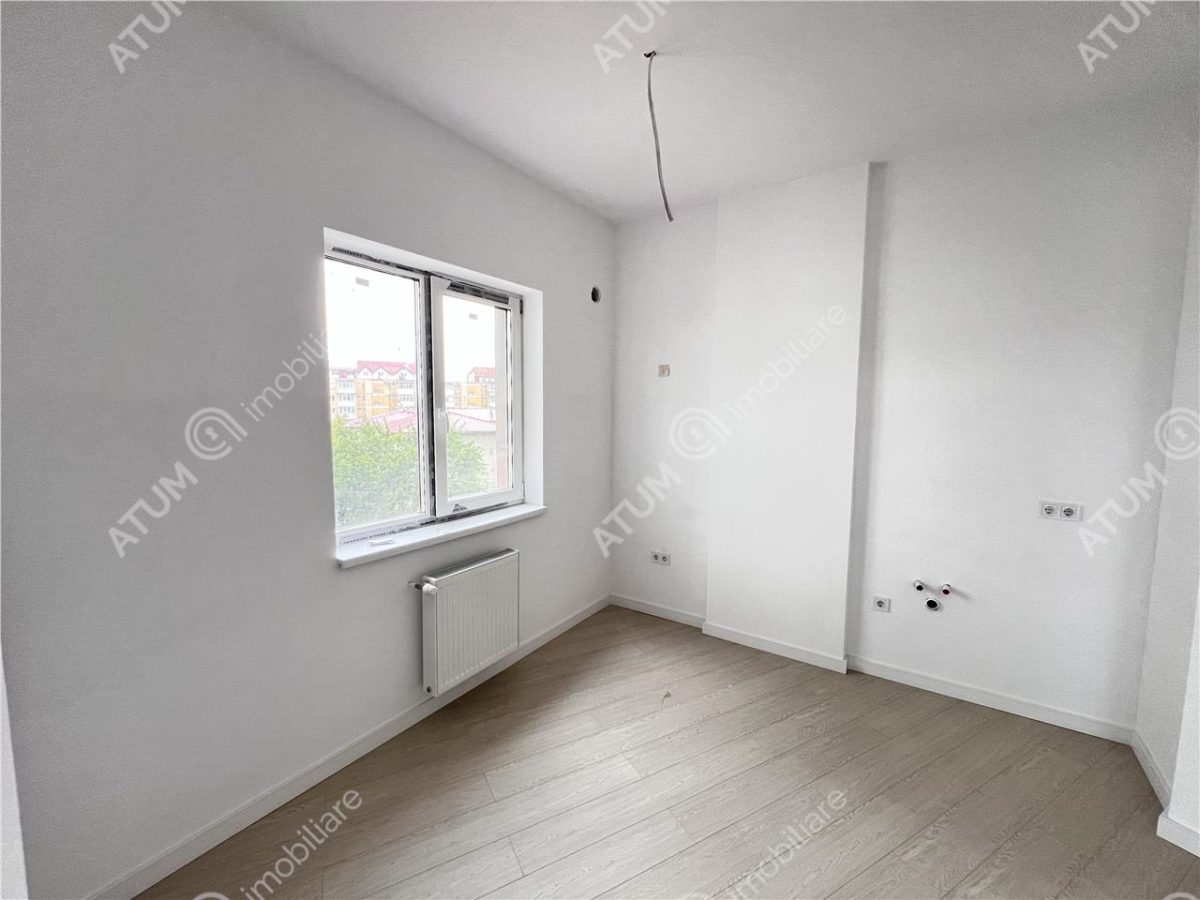 Apartament cu 3 camere 2 bai si 2 balcoane zona Rahovei Sibiu - 