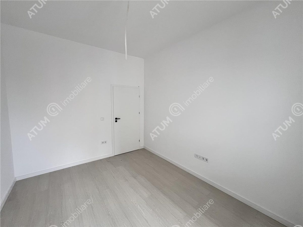 Apartament cu 3 camere 2 bai si 2 balcoane zona Rahovei Sibiu - foto 4