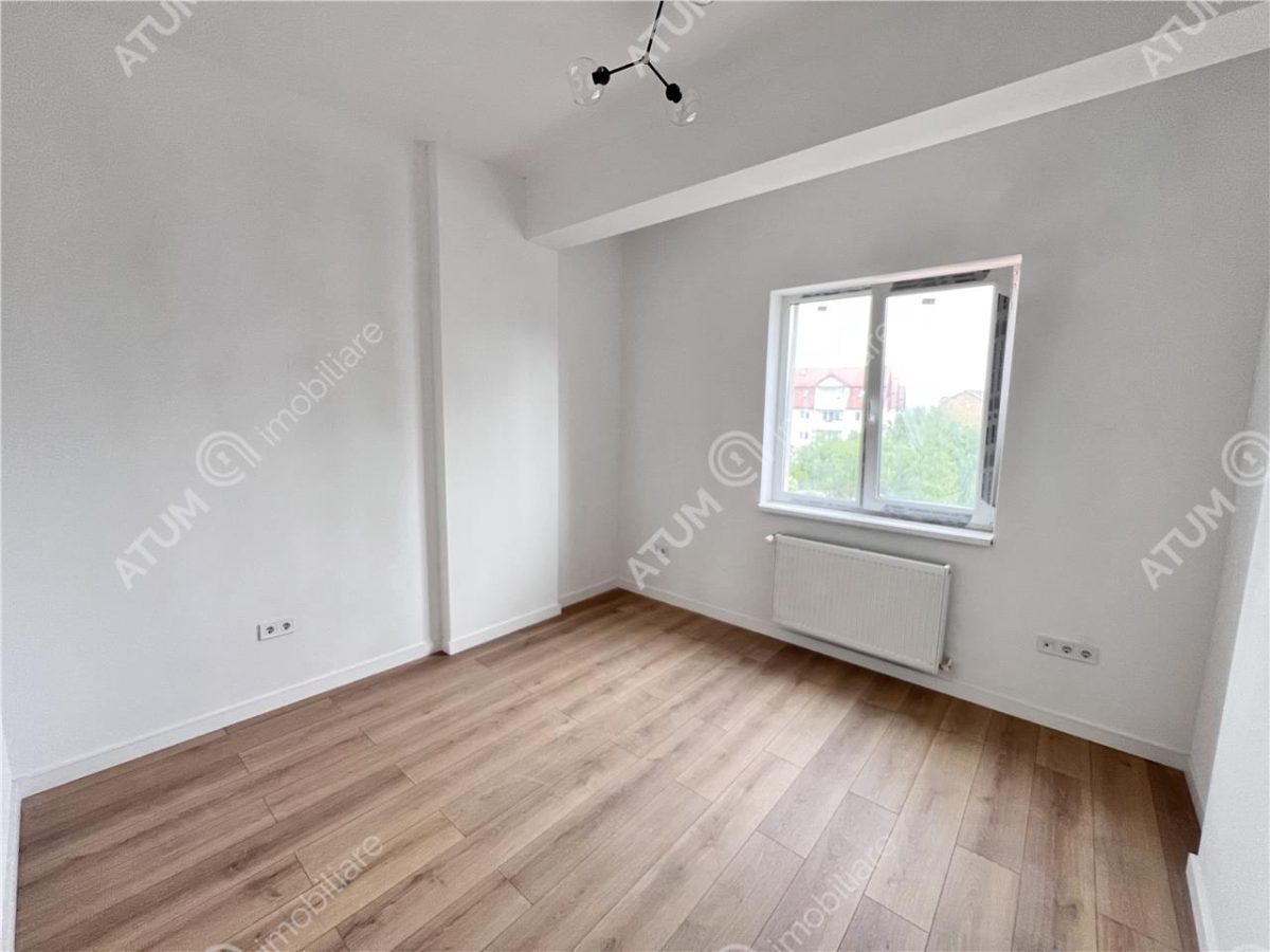 Apartament cu 3 camere 2 bai si 2 balcoane zona Rahovei Sibiu - foto 6