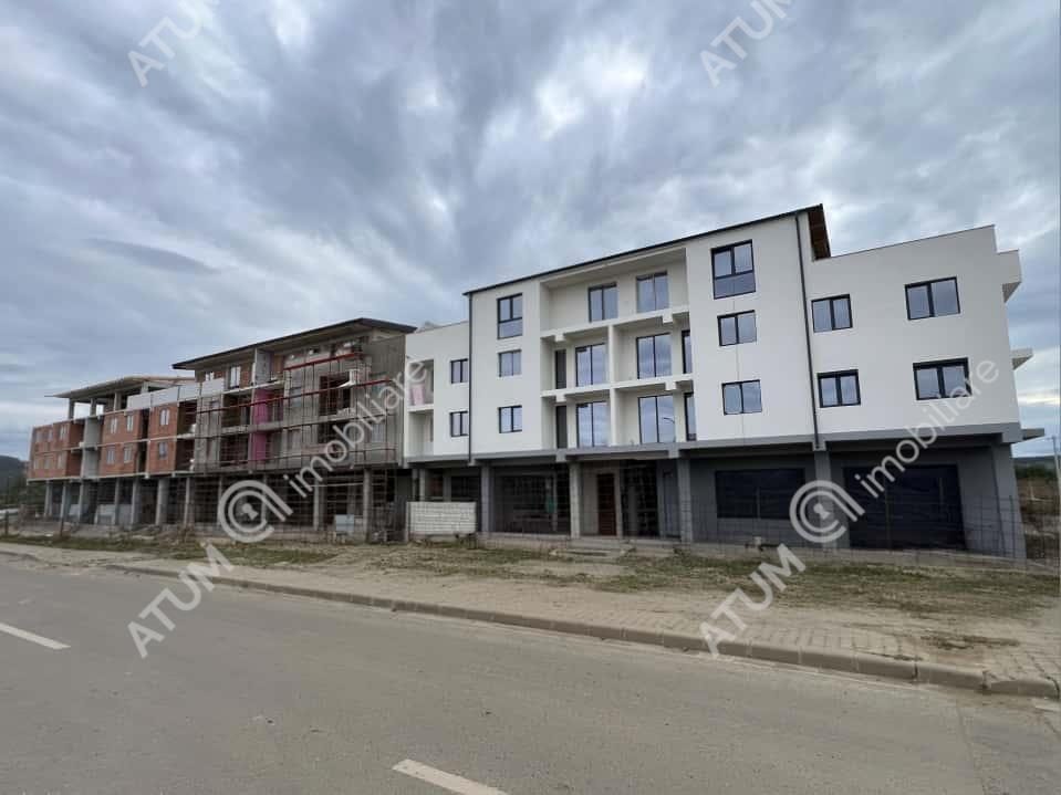 Apartament cu 3 camere 2 balcoane etaj 1 in Selimbar zona Triajului - 