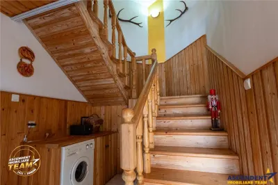 Vila ce incorporeaza anexe gospodaresti si cu potential turistic, in inima statiunii Covasna - foto 20