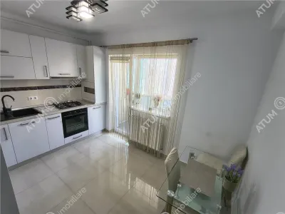 De inchiriat apartament modern la etajul 1 cu 2 camere decomandate, balcon si loc de parcare privat in Sibiu - foto 14